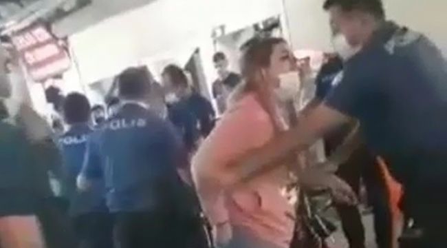 Maske cezası yazmak isteyen polise yumruk attı