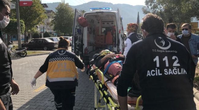 Otomobille çarpışan motosiklet sürücüsü kadın yaralandı