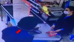Müşteri gibi gelip silah çekerek marketi soydu