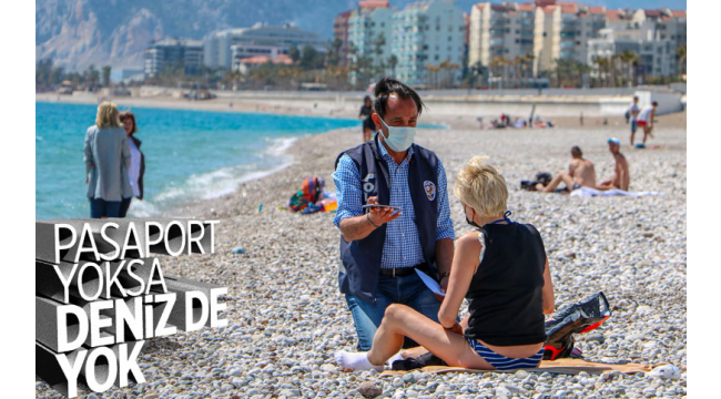 Denize giren turistlerin pasaportu kontrol edildi