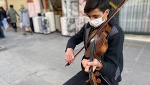 Nota bilmeyen kemancı