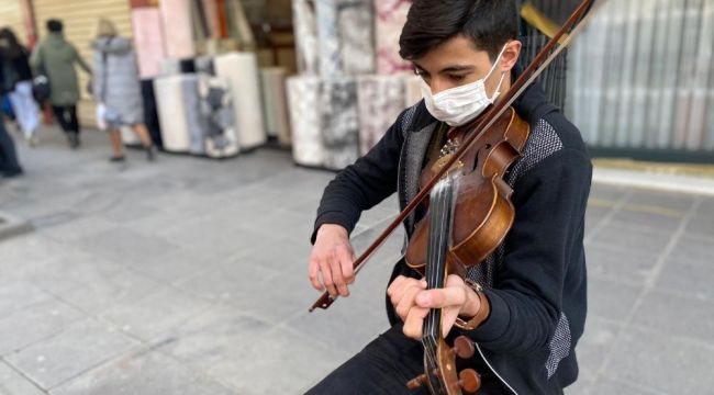 Nota bilmeyen kemancı