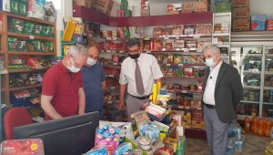 İhtiyaç sahiplerinin veresiye defterlerini sildiler