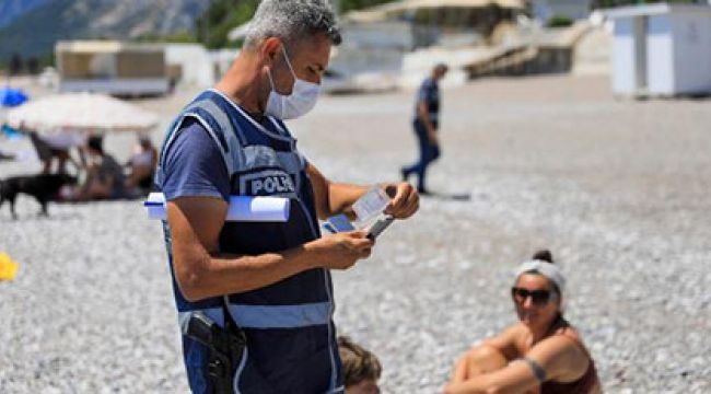 Plajda pasaport kontrolü! Türk'e ceza