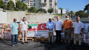 Kuveytlilerden sel mağdurlarına yardım eli