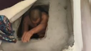 Aranan zanlı salona kazdığı çukurda yakalandı