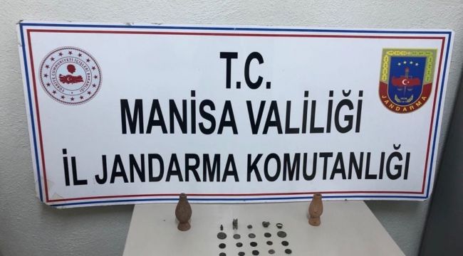 Takibe alınan araçta 30 sikke ve tarihi eserler ele geçirildi