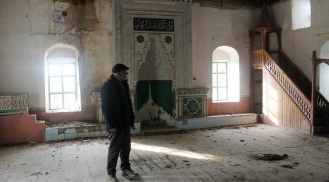 135 yıllık ahşap minareye sahip çıkıyorlar