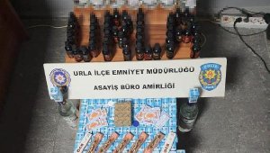 İzmir'de markete 'kaçak sigara ve içki' baskını