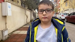 Köpek saldırısı sonrası yüzüne 60 dikiş atılan Mert, günler sonra sokağa çıktı