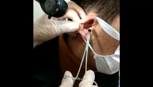 Kulağından kopya düzeneği çıktı