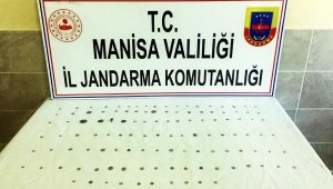 Ahmetli'de 119 tarihi sikke ve obje ele geçirildi