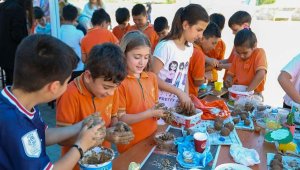 Buca'da çocuklar 'tohum topu' yaptı