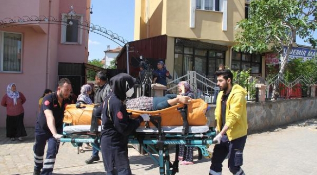Evde düşen kadının yardımına itfaiye yetişti