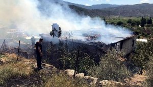 Alevlerin arasından komşuları kurtardı