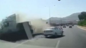 Karşı şeride geçen TIR'dan son anda kurtuldu