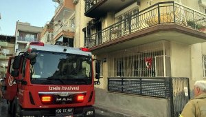 İtfaiye ekipleri yatalak hasta ile kediyi kurtardı