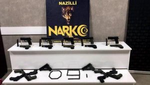 Otomobilinde 20 tabancayla yakalandı