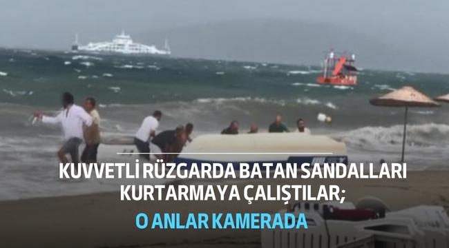 Kuvvetli rüzgarda batan sandalları kurtarmaya çalıştılar; o anlar kamerada