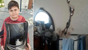 12 yaşındaki Muhammet, ağır hasarlı binaya girip kedisini kurtardı