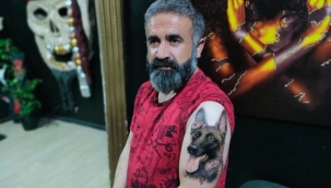 Hayatını kurtaran köpeğin dövmesini yaptırdı