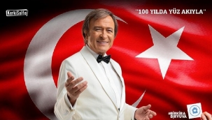 Sanatçı Erol Evgin, 'Bir Kira Bir Yuva' dayanışma konseri için sahnede