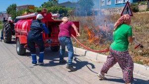 Yangını birlikte söndürüyorlar