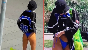 Ünlü manken sokakta bikinisinin ipini çözdü