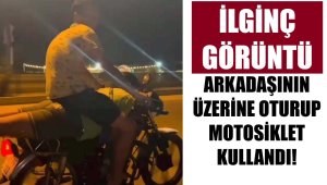 Yüzüstü yatan kişinin üzerine oturup, motosiklet kullandı
