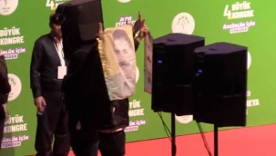 Teröristbaşının paçavrasını açtı, tutuklandı