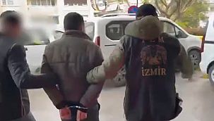 İzmir'de PKK operasyonunda şüphelinin açmadığı kapı koçbaşıyla kırıldı