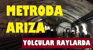Metro arızalandı, yolcular raylara indi